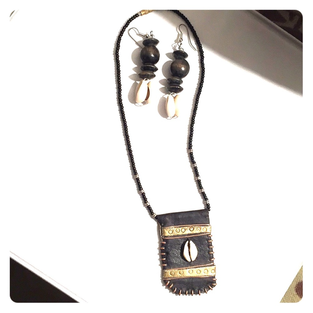 Nice little set-leather and cowrie shell
